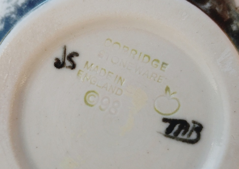 The base of a Cobridge Corncockle vase showing the full range of markings typically found. The Date Cypher here is the apple, indicating 1998 which matches the Copyright year.