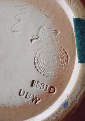 The base markings on my vase showing the design code, the Royal Doulton stamp and the artist's mark